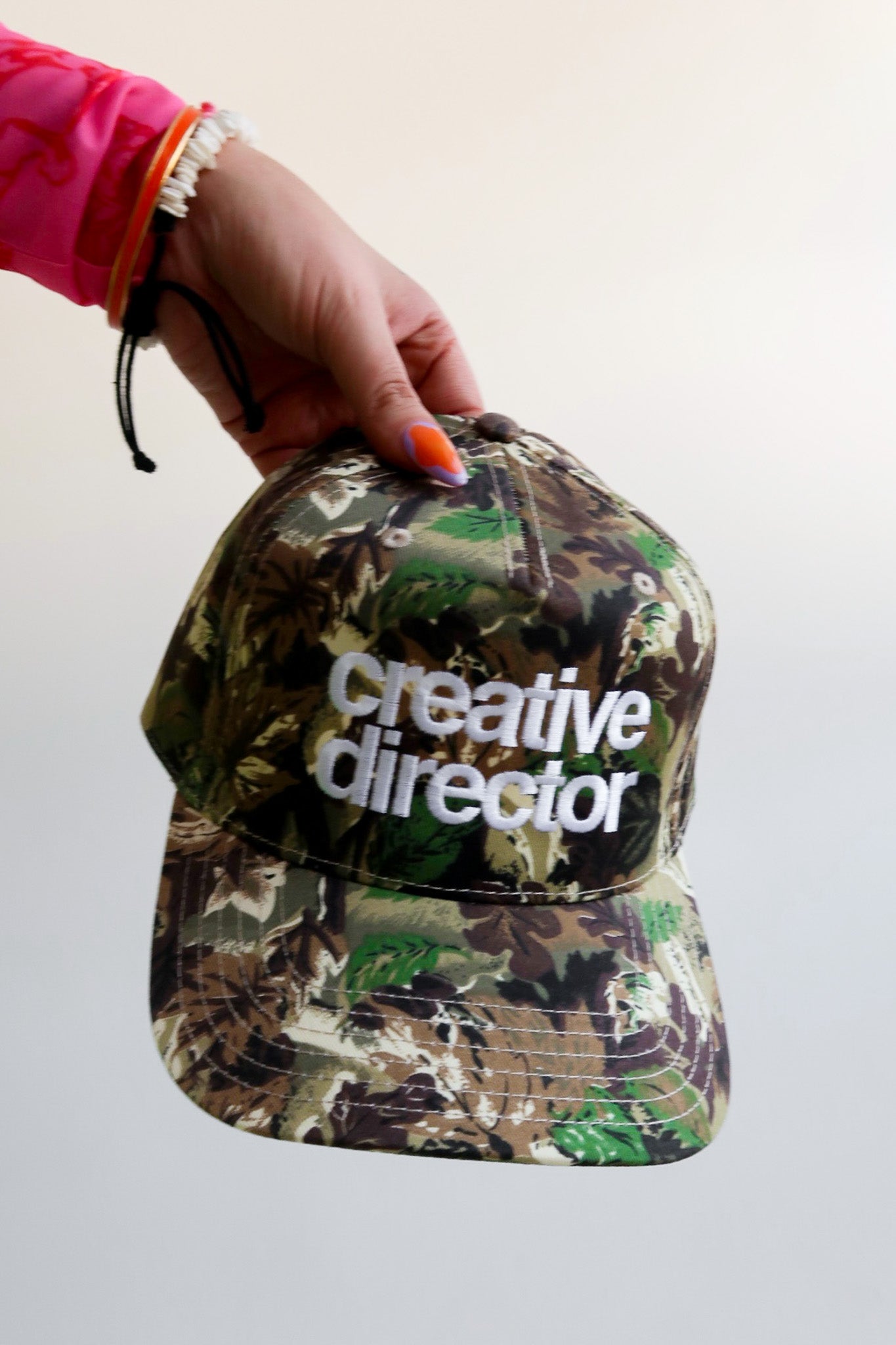 Creative Director Camo Trucker Hat