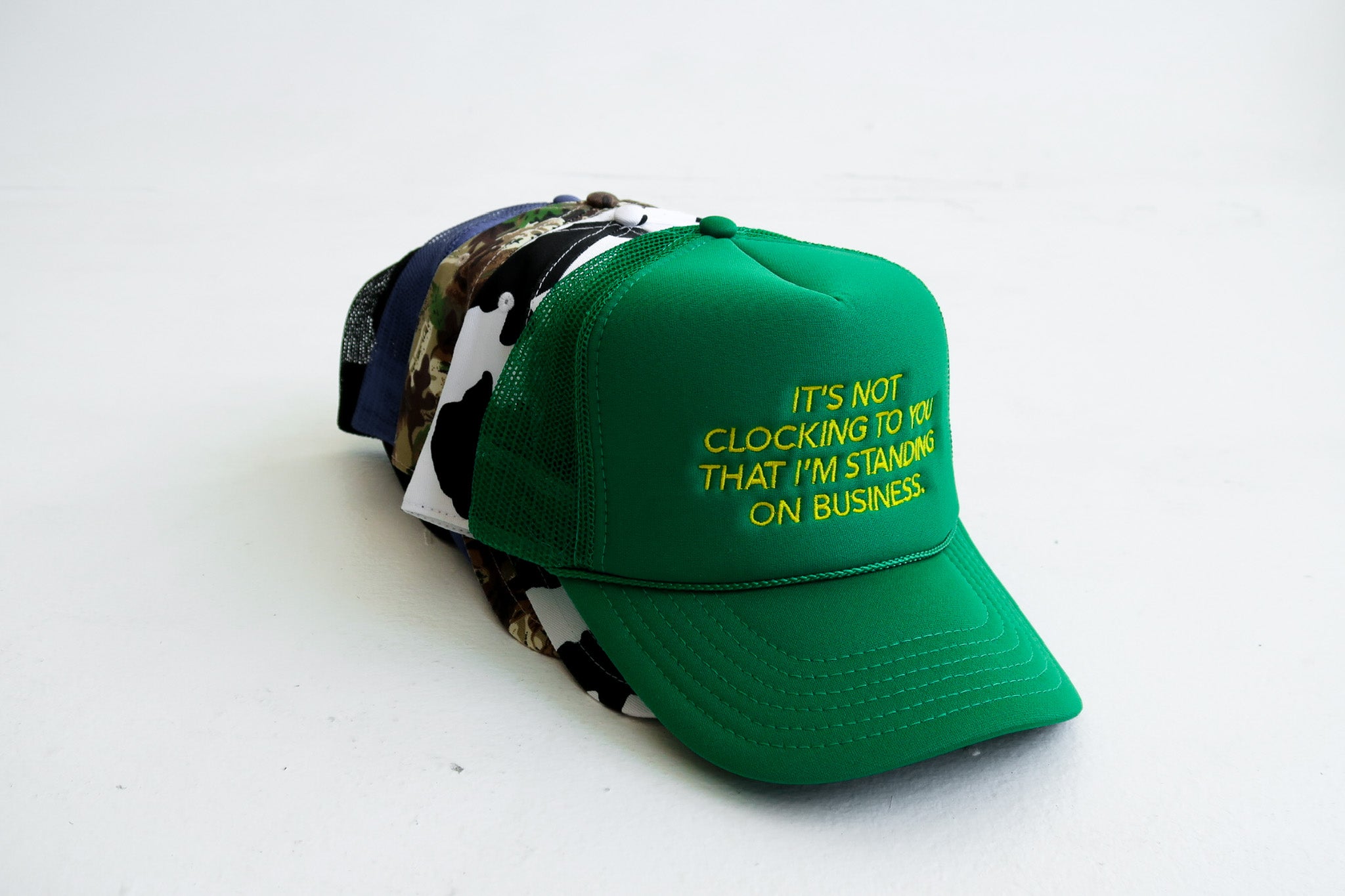 It's Not Clocking Embroidered Green Trucker Hat