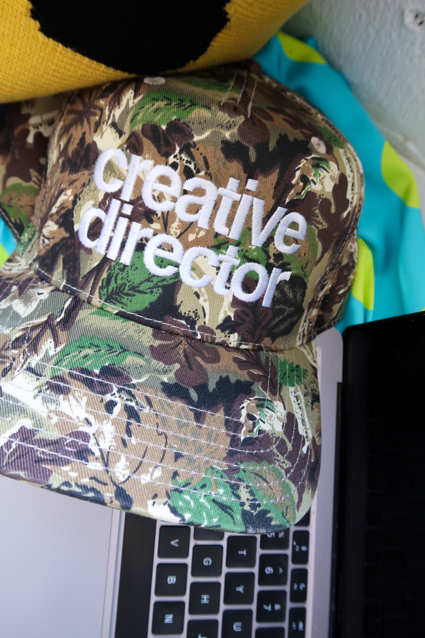 Creative Director Camo Trucker Hat