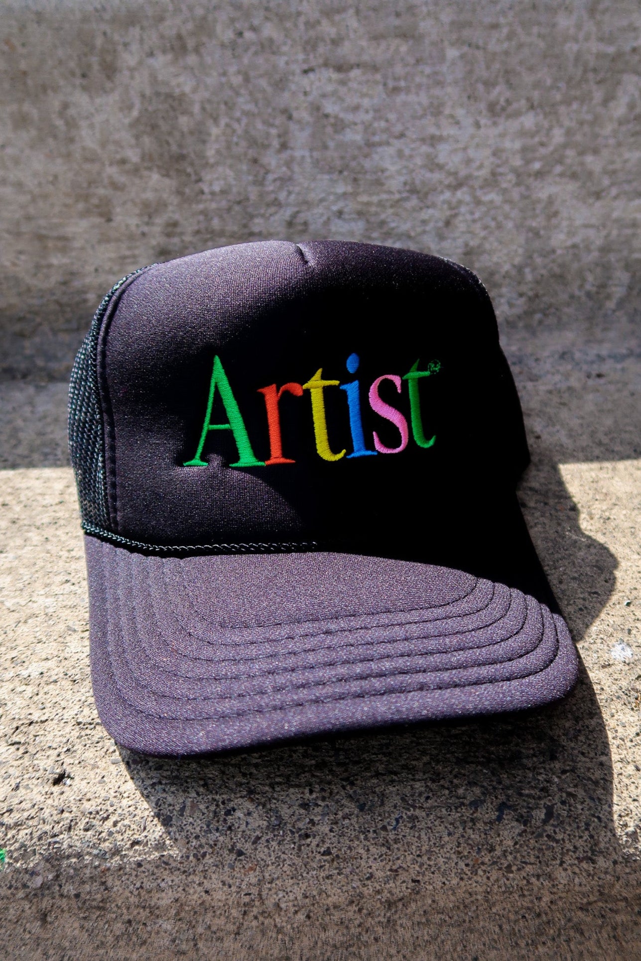 Artist Embroidered Black Trucker Hat