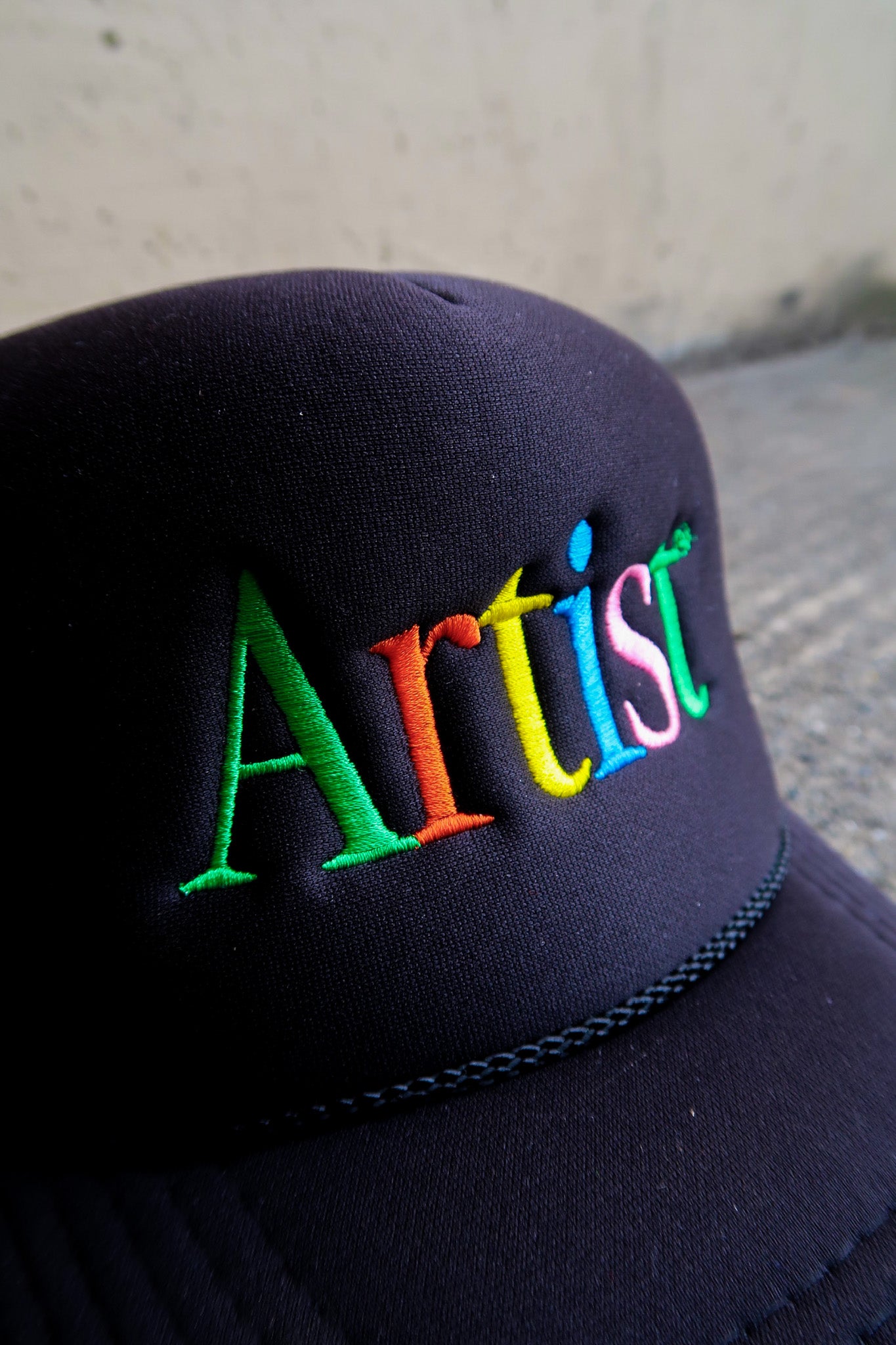 Artist Embroidered Black Trucker Hat