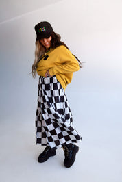 **PRE-ORDER: ships by 9/15** Victory Lap Checkered Maxi Pleated Skirt